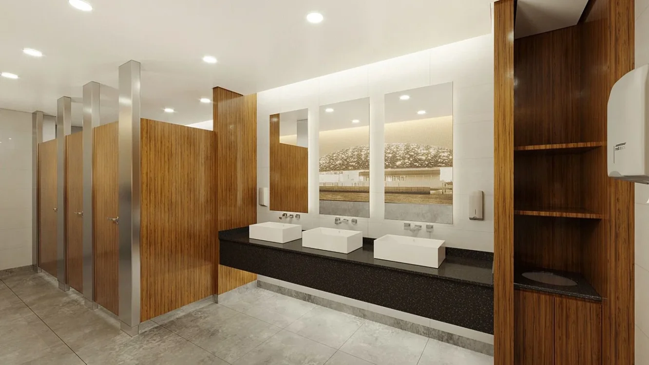 Elegant Office Staff Bathroom Interior Design showcasing modern fixtures and ambient lighting.